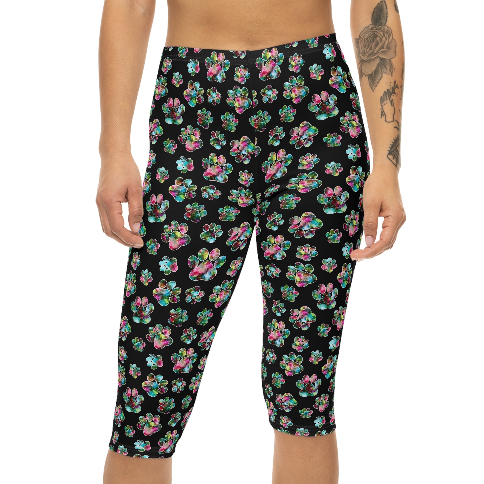 Front view of Angel Paws Capri Leggings by Alisa Marie. Colorful paw prints design, perfect for spring and summer fitness, yoga, or casual wear.