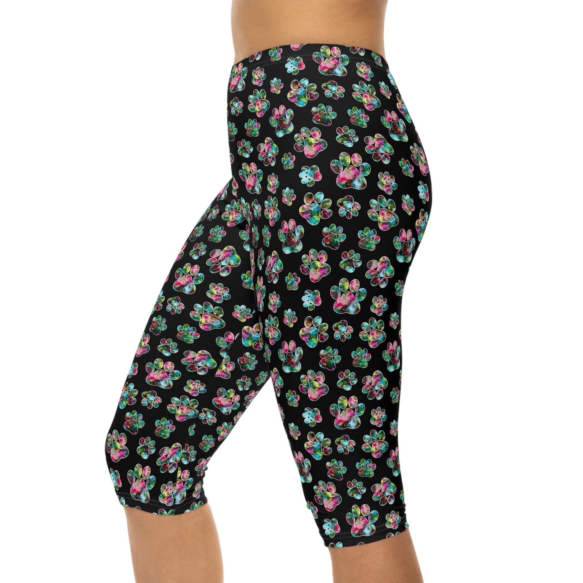 Side view of Angel Paws Capri Leggings by Alisa Marie. Colorful paw prints design, perfect for spring and summer fitness, yoga, or casual wear.