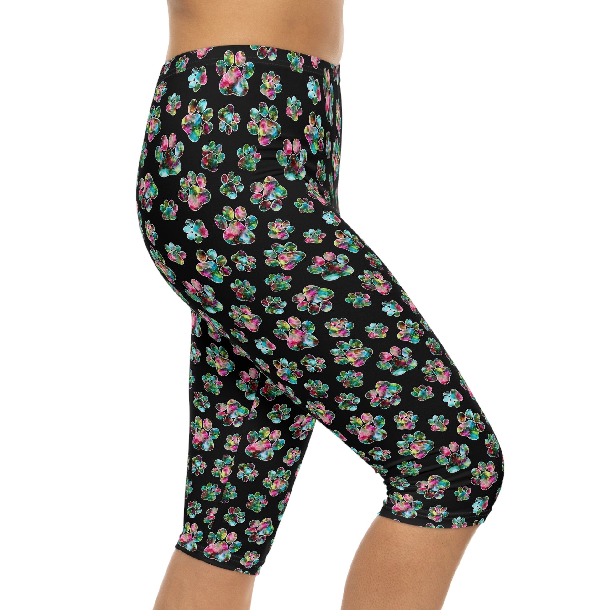 Side view of Angel Paws Capri Leggings by Alisa Marie. Colorful paw prints design, perfect for spring and summer fitness, yoga, or casual wear.