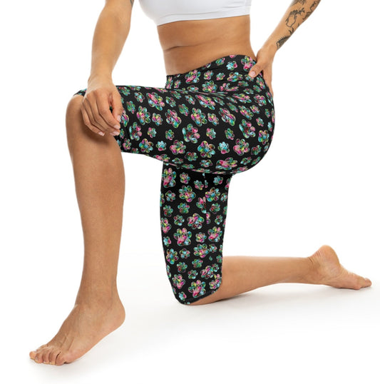 Model in action wearing Angel Paws Capri Leggings by Alisa Marie. Colorful paw prints design, perfect for spring and summer fitness, yoga, or casual wear.