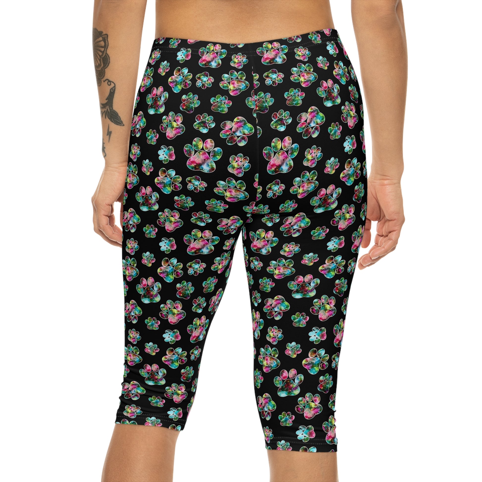 Back view of Angel Paws Capri Leggings by Alisa Marie. Colorful paw prints design, perfect for spring and summer fitness, yoga, or casual wear.
