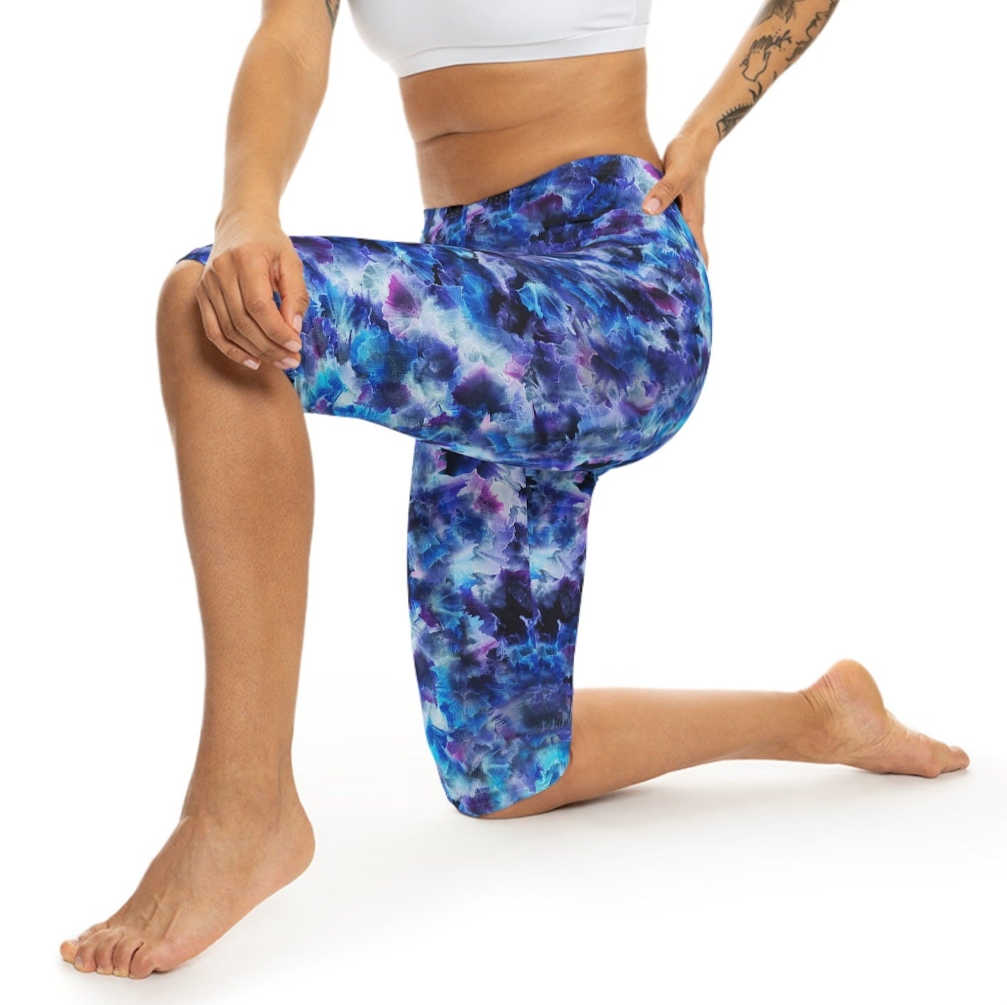 Cosmos Capri Leggings for Women by Alisa Marie– Bold starry design in vibrant blue, purple, and black, ideal for activewear, yoga, or casual wear.