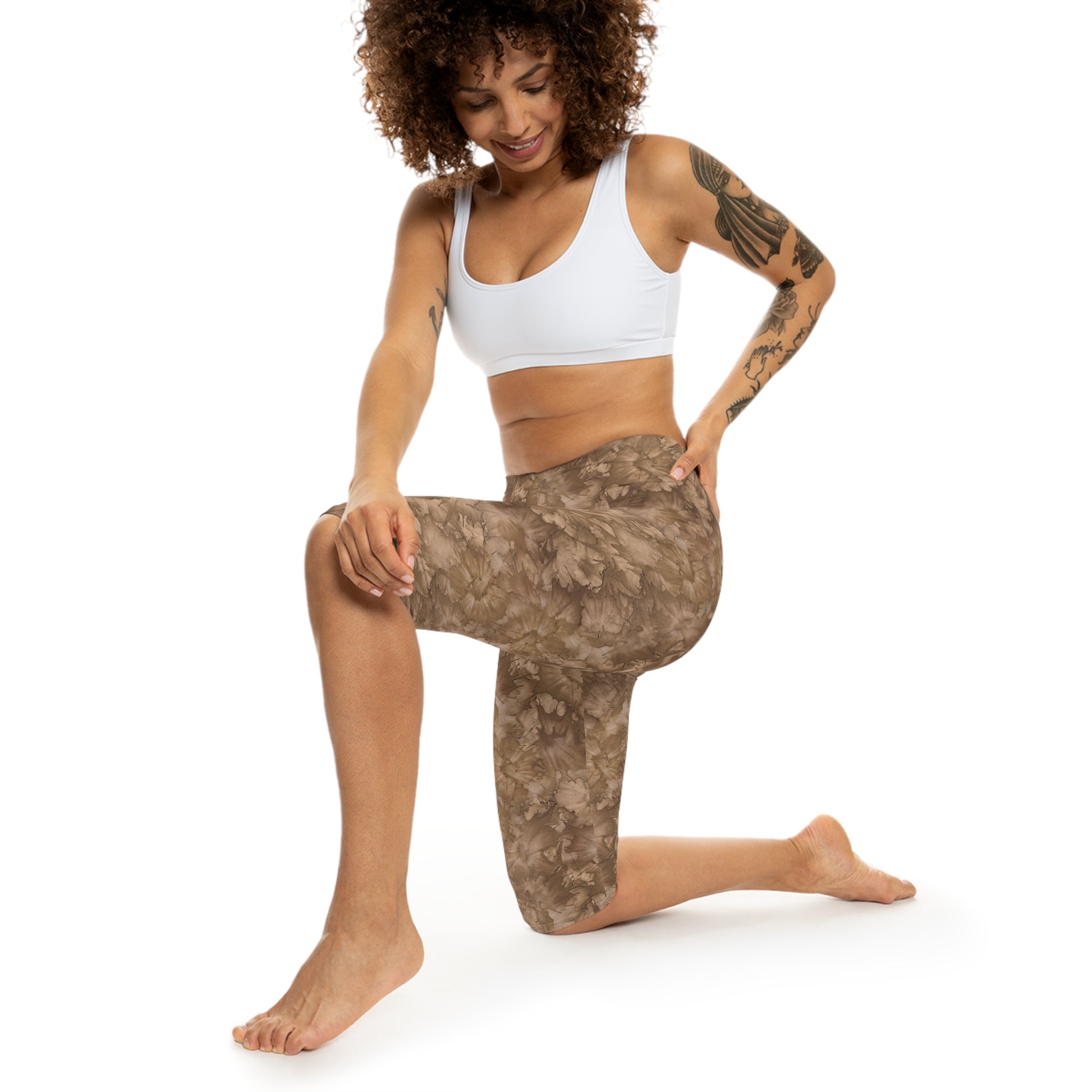 Action view of model wearing Mocha Bliss Capri Leggings by Alisa Marie. Earthy tones design, perfect for yoga, fitness, or casual everyday wear.