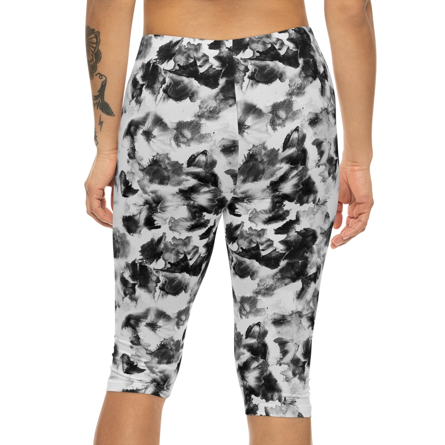Back angle of Moonlight Capri Leggings-comfort fit in stylish monochrome floral print.