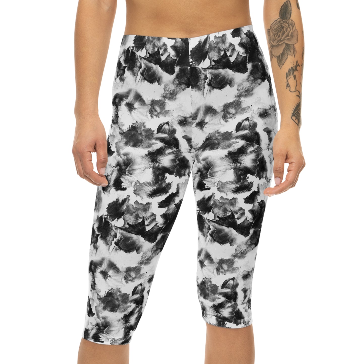 Front view of Moonlight Capri Leggings-black and white floral design for women's activewear.