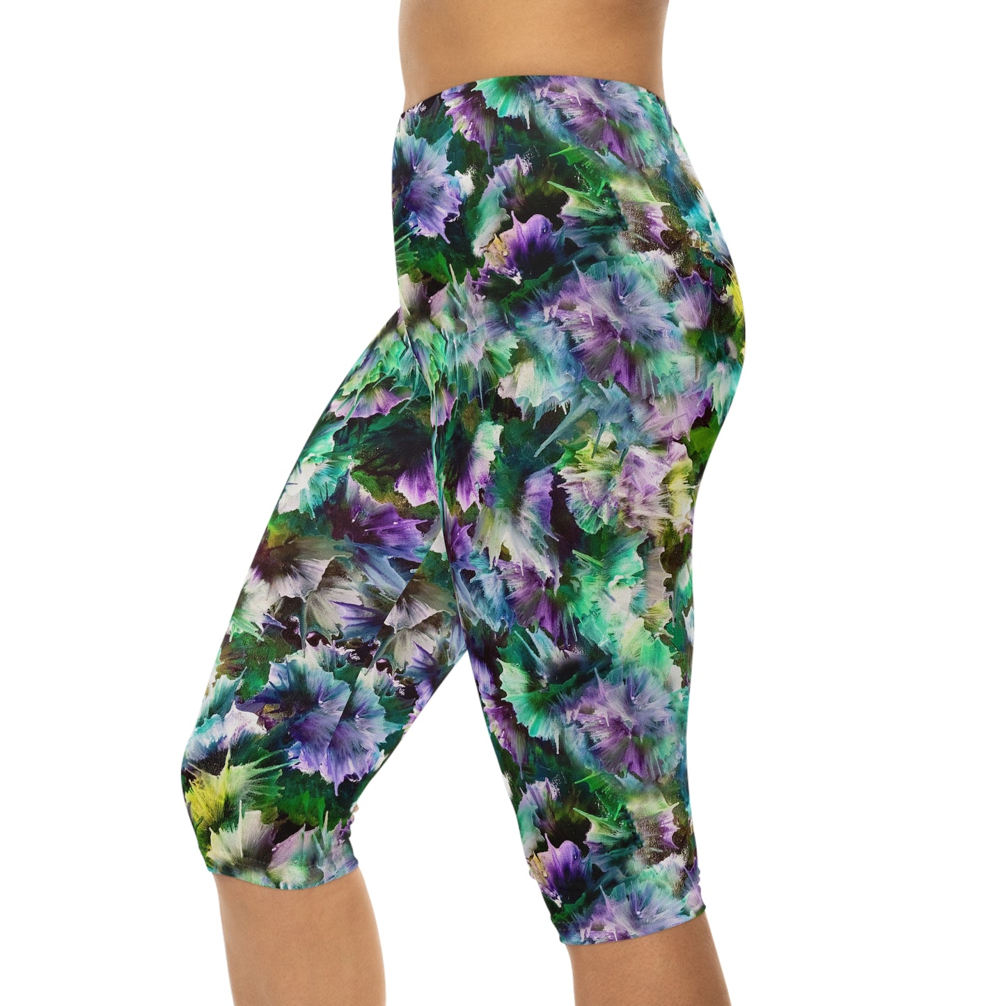 Model wearing northern Lights capri Leggings. Activewear for yoga fitness, and casual wear with a vibrant, dynamic design.
