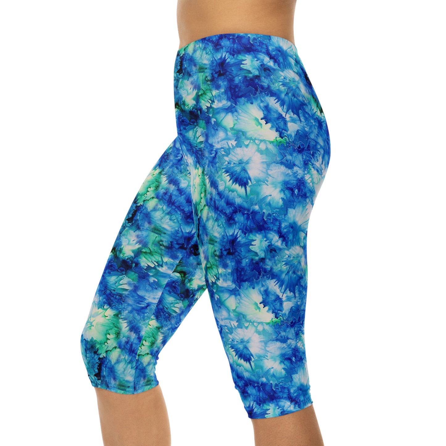 Side view of Ocean Mist Capri Leggings by Alisa Marie. The Coastal Blue design is perfect for yoga, fitness, or casual outings.