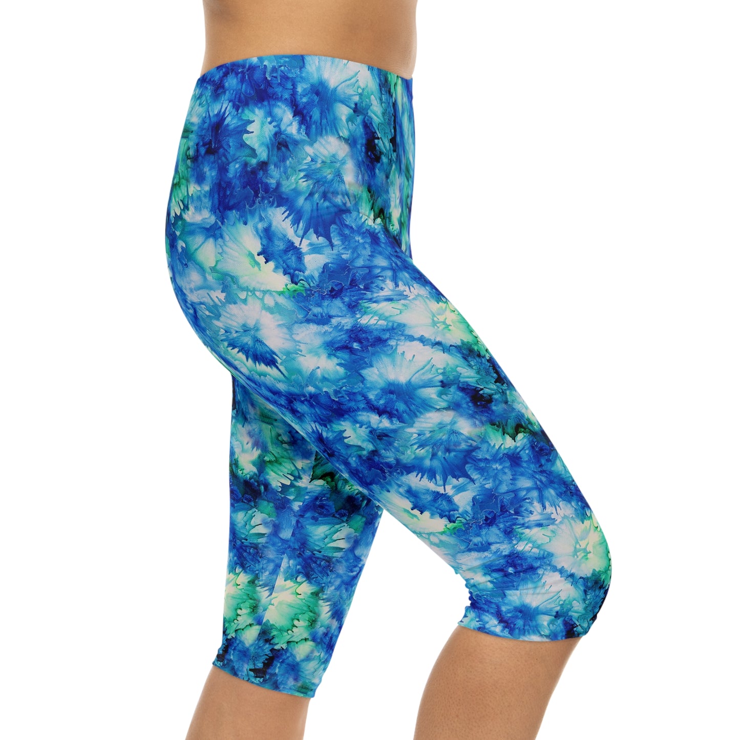 Side view of Ocean Mist Capri Leggings by Alisa Marie. The Coastal Blue design is perfect for yoga, fitness, or casual outings.
