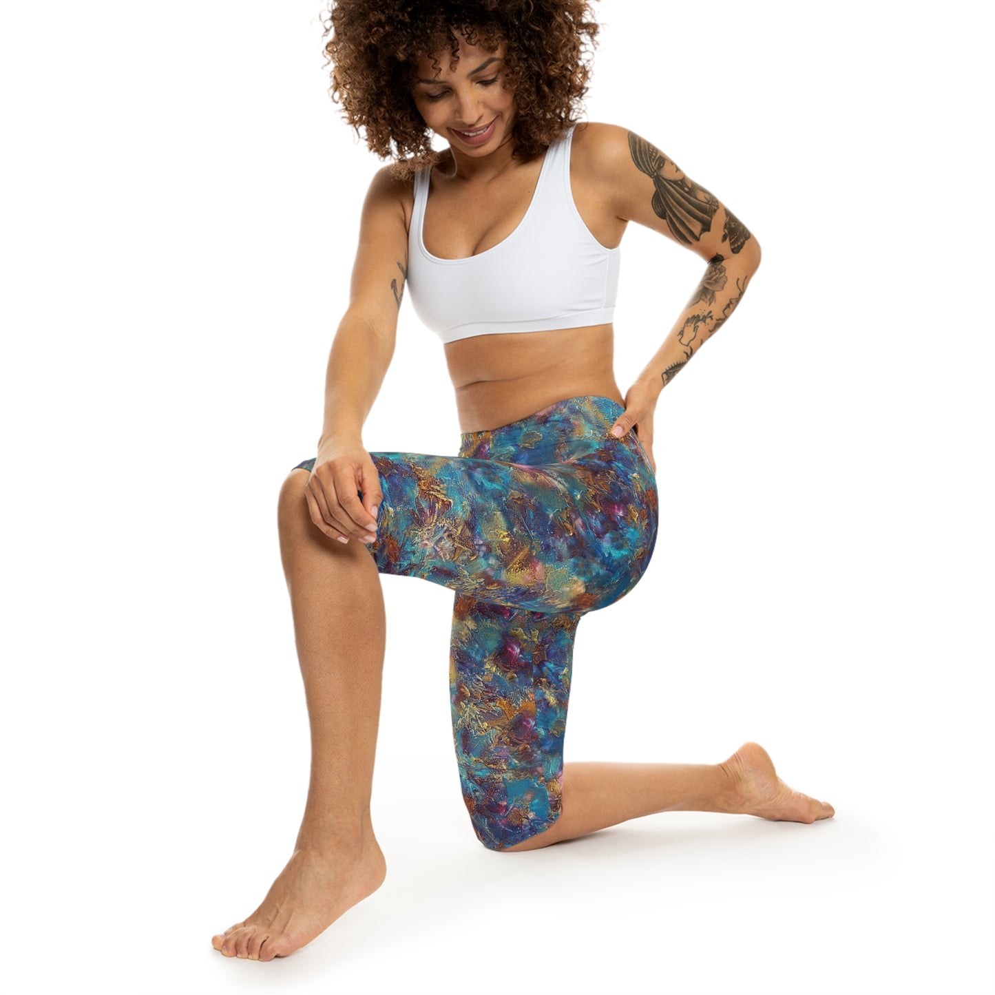Action view of model wearing Oceanic Capri Leggings by Alisa Marie. Coastal-inspired design, perfect for yoga, fitness, or casual everyday wear.